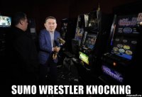  sumo wrestler knocking