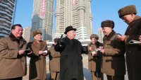 Создать мем Ким Чен Ын рыба