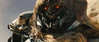 Создать мем Transformers 3 DOTM Megatron in Africa