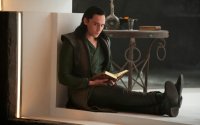 Создать мем Loki imprisoned in prison in the asgard