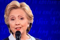 Создать мем On the forehead of Hillary Clinton- a fly has landed