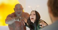 Создать мем Drax and Mantis are laughing at The Guardians of the Galaxy Vol