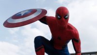 Создать мем Spider-Man Holds the Captains Shield of America