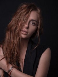 Слава Каминская
