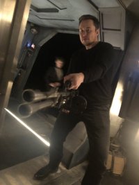 Создать мем Илон Маск с огнеметом