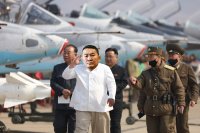Создать мем Kim Jong Battulga in North Korean airfrield