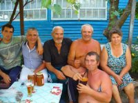 Создать мем Одна среди мужиков