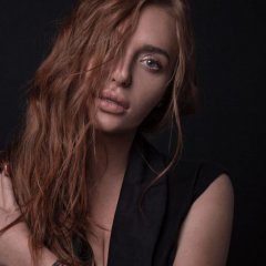 Слава Каминская