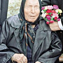 Ванга в цвете с цветами