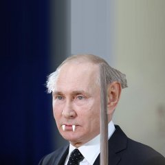 Путин