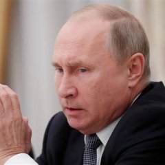Путин