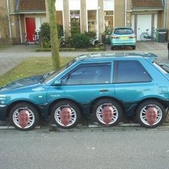 Kim Jong Un head on car wheels