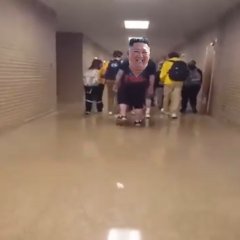 Kim jong Un walking in the halls